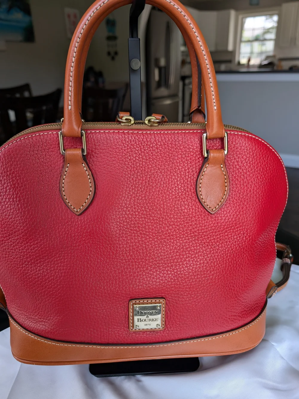 Dooney & Bourke Red Pebbled Leather Satchel with Tan Trim.Used In Great Conditio